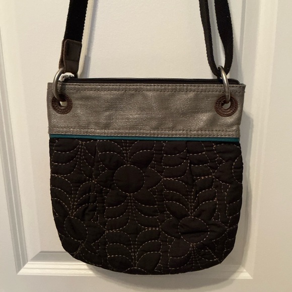 Fossil Crossbody Bag. Black with gray and turquoise trim. Adjustable strap - Picture 2 of 6
